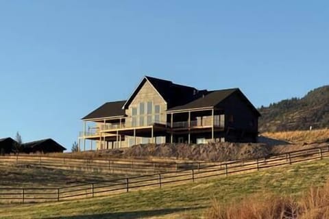 Back View of Cabin with Large Patio ad Balconies
