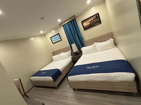 Standard Double or Twin Room | In-room safe, desk, laptop workspace, blackout drapes