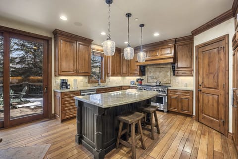 Kitchen: Drip coffee maker, Sub-Zero fridge, Wolf oven, cooking utensils