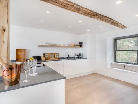 Full, private kitchen with all amenities and cooking utensils