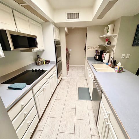 Galley kitchen will double ovens, microwave, stove top and dish washer.