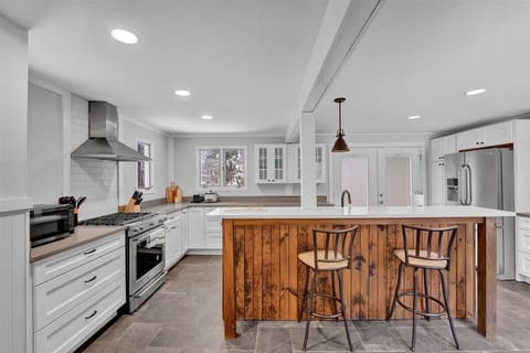 Bright Open Kitchen with Island and Bar Seating