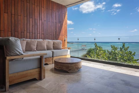 Enjoy a private terrace overlooking the ocean.