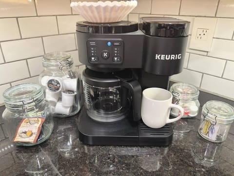 Coffee & Tea Bar: starter kit of K-cup pods, assorted teas, creamer, and sugar. Filters are provided for carafe brewing. Please bring your own ground coffee (we know everyone has different favorites).