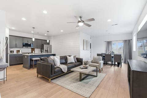 Downstairs Living Room, open floor plan into Kitchen & Dining