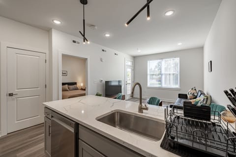 Deluxe Apartment, 1 Queen Bed with Sofa bed, Kitchen, Courtyard View | Living area | 50-inch flat-screen TV with digital channels, streaming services
