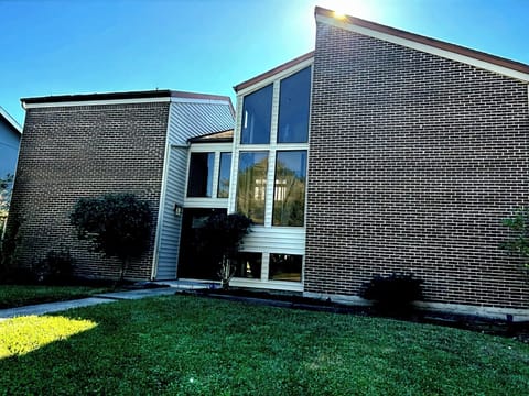 custom built home with an abundance of light