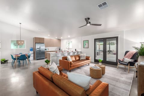 The cozy living room and open kitchen area with plenty of room to spread out