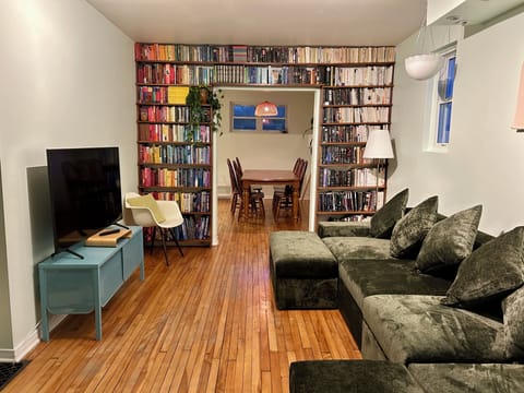 Floor-to-ceiling library wall in the Living Room offers endless hours of reading