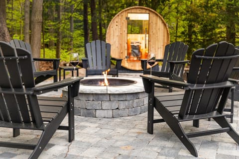 Gather around the fire with friends and soak in nature's beauty on our peaceful wooded lot. 