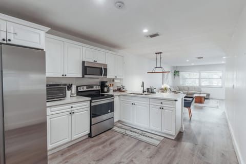 Spacious kitchen fully equipped with oven, air fryer, coffee maker & more