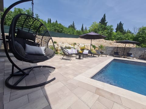Villa (Four - Bedroom Villa) | Outdoor pool | Seasonal outdoor pool, sun loungers