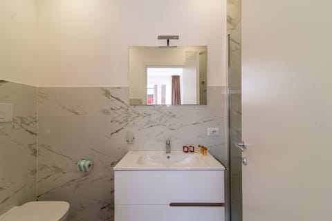 Family Quadruple Room, Tower | Bathroom | Shower, hair dryer, towels, soap