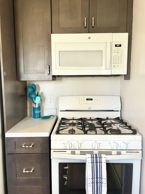 Gas range, oven, and microwave