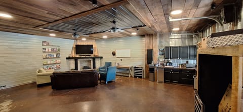 Rec room in main house. Dart board, ring toss game, Game closet with many games.