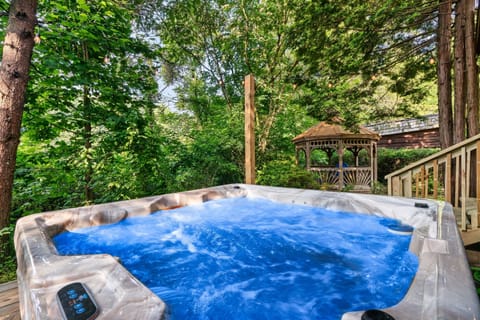 Soothe your body and soul in our inviting hot tub retreat.