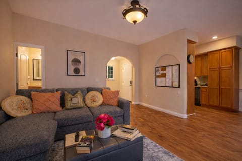 Living area with wall-mounted smart TV.