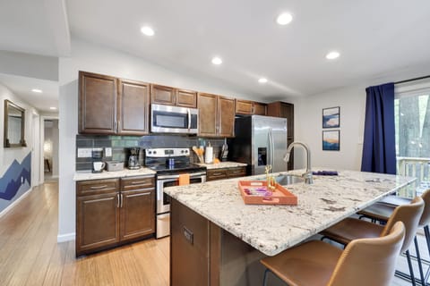 Barstool seating at the island counter.