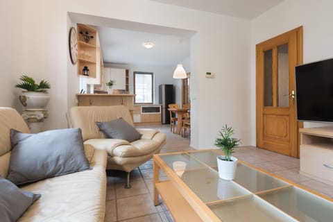 Comfort Villa, Garden View | Living area | 140-cm LED TV with cable channels, Netflix, streaming services