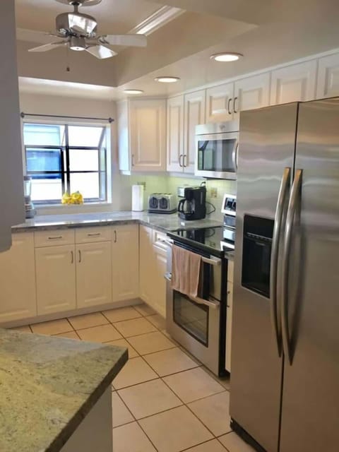 Fully Stocked Kitchen: This modern kitchen has everything you need—granite counters, stainless steel appliances, and a wine fridge. Whether cooking a gourmet meal or grabbing a snack, it's designed for convenience and style.