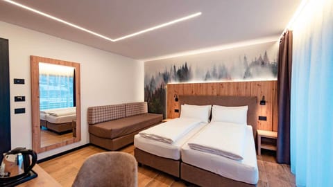 Comfort Triple Room, Balcony | In-room safe, desk, soundproofing, free WiFi