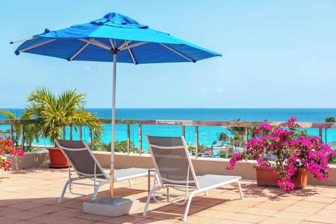 Watch approaching planes from the pool deck while catching rays.