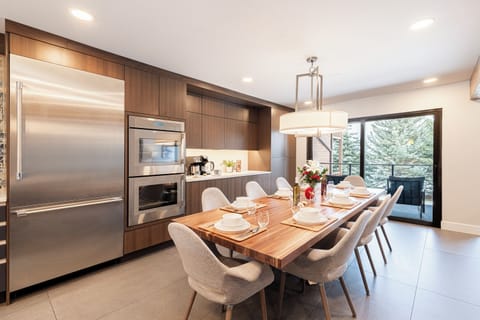 Dining area/sliding glass door for deck access