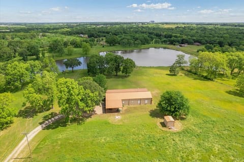 Outside view featuring  the 12 acre private pond