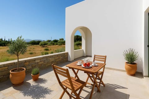Private patioPrivate Patio – Garden View and Bistro Table
Relax in a quiet outdoor setting with traditional island flair.
