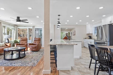 Experience the seamless flow of our open kitchen, living, and dining area, creating the perfect space for family gatherings, cooking, and dining together.