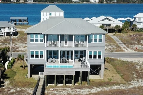 Gorgeous oceanfront pool with stunning views, perfect for relaxation. Enjoy alfresco dining under the stars, cozy up on plush lounge chairs, and soak in the beauty. A luxurious, serene escape where every moment feels peaceful and luxurious.