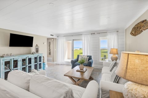 Spacious Living Room with a Flat Screen TV and Breathtaking Views