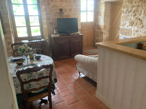The living and dining space comprises a place to relax, cook and eat.
