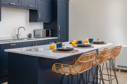 Indulge your inner chef in the elegant, fully equipped kitchen, complete with high-end appliances and everything you need to create and enjoy gourmet home-cooked meals.