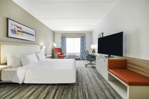 Room, 1 King Bed, Roll-in Shower | Blackout drapes, iron/ironing board, free cribs/infant beds, bed sheets