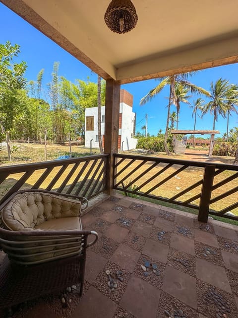 Standard Quadruple Room, Lanai, Garden View | Living area