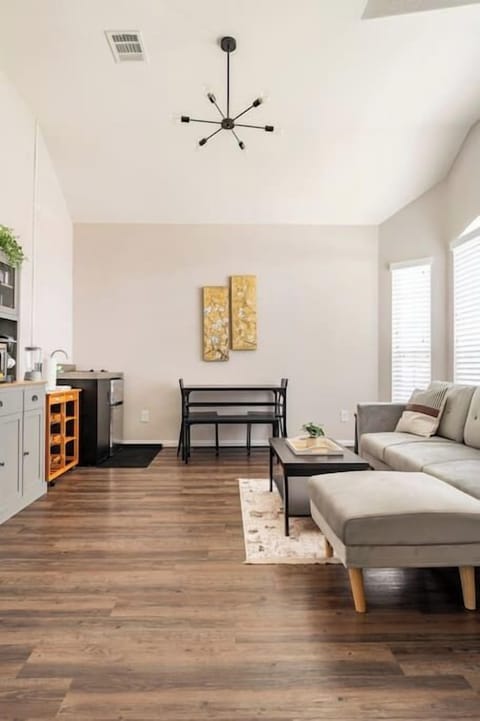 Living room + dining + open kitchenette concept