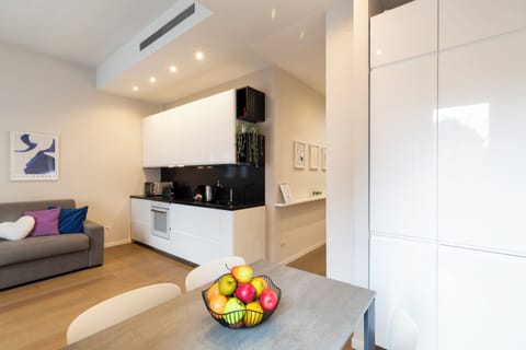Deluxe Apartment, City View | Living area | 50-inch Smart TV with digital channels