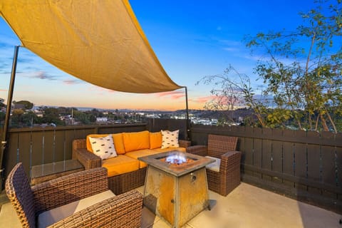Relax by the fire pit on our scenic terrace, offering breathtaking views—perfect for sunset watching and unwinding.