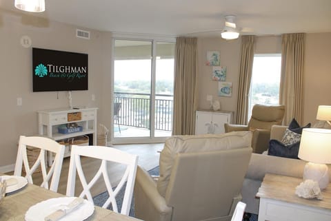 You'll love relaxing in this bright, coastal-themed space with comfy seating and beautiful balcony views.