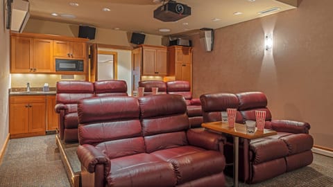 Cozy leather seating in the theater room