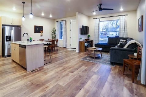 Bright open-concept living, kitchen & dining space—perfect for families and groups

