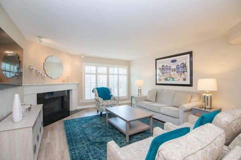 Spacious and stylish living room with plush seating—perfect for relaxing or entertaining.