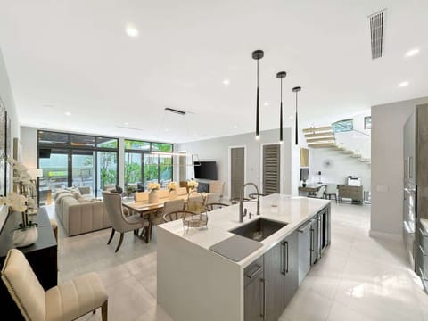 Cook up a feast in the fully stocked kitchen, complete with all the appliances you need for a home-cooked meal.