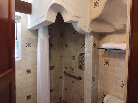 Luxury Suite, 2 Double Beds | Bathroom | Shower, hair dryer, towels, soap