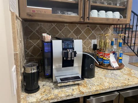 Jura Super-Automatic espresso maker with milk refrigerator - push a button for your favorite drink! We supply dark roast beans and water refills automatically from osmosis system. We also have drip coffeemaker and electric tea kettle with various teas.