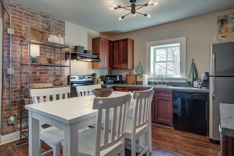 Fully furnished kitchen with appliances and dinner service for 12