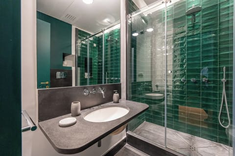 Panoramic Double Room, Balcony, Partial Sea View | Bathroom | Bathrobes