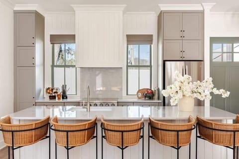 Chef’s Kitchen | First Floor | Fully Equipped | Electric Range | Bar Seating | Open Access to Dining Area | One of Two Identical Kitchens