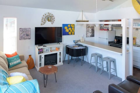 another view of kitchen and living room